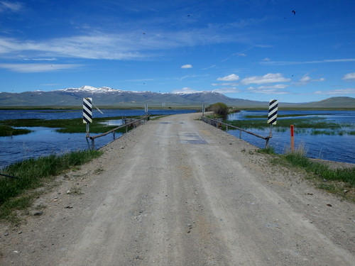 GDMBR: The road across the wetland refuge of Lima Reservoir.